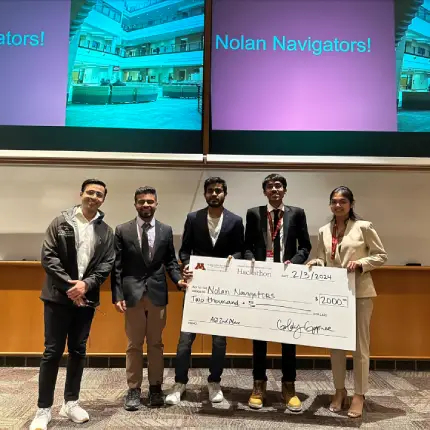 Nolan Navigators, comprised of Pratik Borkar, Priyam Sarkar, Samridhi Vats, and Zeeshan Gilani, with their prize