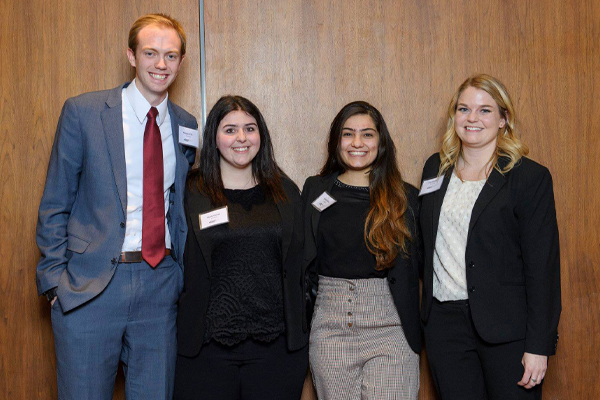 The team for the 2019 Power Shift Case Competition gather after their second-place victory. Students include Morgan Ellis, Maria Hartas, Tanvi Ralhan, and Julie Sutton.
